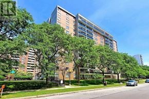 Toronto (Eglinton East) condo for rent - A large apartment building with a playground in front.