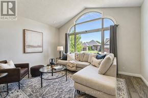 West Perth (Mitchell) apartment for rent - A well-lit living room with a large window and furniture.