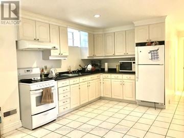 Toronto (Willowdale East) apartment for rent - A white kitchen with a refrigerator, oven, and sink.