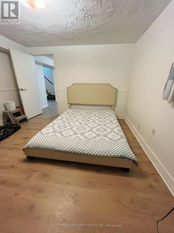 Oakville (Wo West) apartment for rent - A bedroom with a bed and a window.