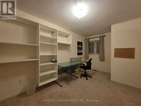 Richmond Hill (Westbrook) apartment for rent - A room with a desk and chairs in it.