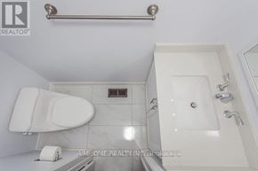 Toronto (L'amoreaux) townhouse for rent - A white bathroom with a toilet, sink, and shower.