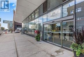 Toronto (Waterfront Communities) condo for rent - The front of a building with the number 28 on it.