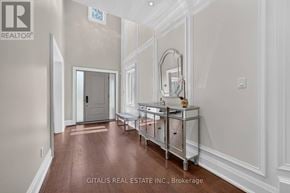 Toronto (Kingsway South) apartment for rent - A hallway with a mirror and a vanity table.