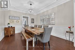 Toronto (Kingsway South) apartment for rent - A dining room with a wooden table and grey chairs.