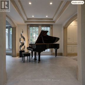 Toronto (Bridle Path-Sunnybrook-York Mills) apartment for rent - A grand piano sits in a spacious room with a large sculpture beside it.