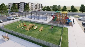 Sterling Heights apartment for rent - A playground with a swing set and a slide.