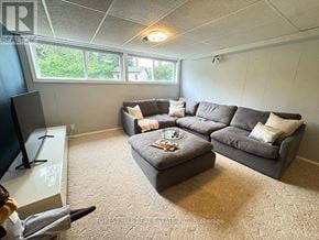 London North (North G) apartment for rent - A living room with a grey couch and a coffee table.