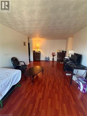 Waterloo apartment for rent - A living room with a wooden floor and a white ceiling.