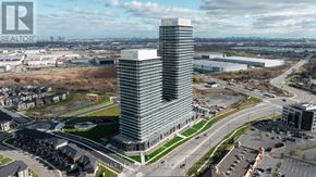 Brampton (Bram East) condo for rent - A modern high-rise building is the focal point of a well-planned urban development.
