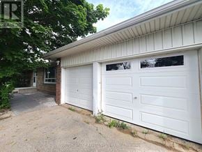King apartment for rent - A white garage door is on the right side of the image.