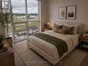 Milton (Tm Timberlea) condo for rent - A bedroom with a large bed and a view of the outside.