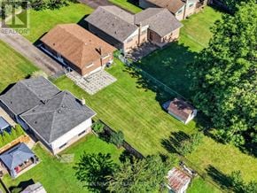Niagara Falls (Arad/Fallsview) apartment for rent - A bird's eye view of a residential area with houses and green lawns.