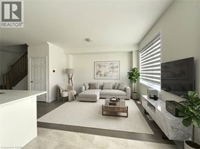 Breslau townhouse for rent - A living room with a white sofa set and a coffee table.