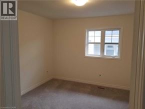 Cambridge apartment for rent - A room with a window and a carpeted floor.