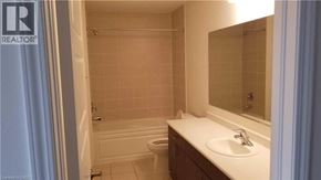 Cambridge apartment for rent - A house with a black door and a sign that says REALTOR.