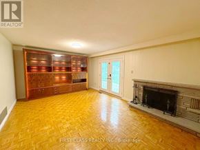Mississauga (Lakeview) apartment for rent - A room with a fireplace and a wooden floor.