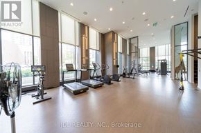 Toronto (Willowdale East) condo for rent - A gym with treadmills, weights, and exercise equipment.