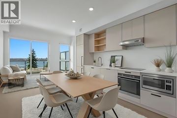 North Vancouver apartment for rent - A modern kitchen with a dining table and chairs.