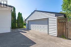 Port Colborne (Sugarloaf) apartment for rent - A residential property with a garage and a driveway.