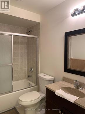 Mississauga (Hurontario) townhouse for rent - A bathroom with a toilet, sink, and shower.
