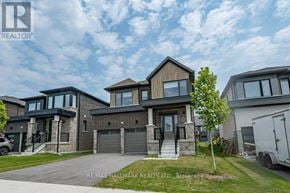 Wasaga Beach apartment for rent - A large, modern house with a garage is for sale.