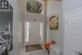 London North (North C) apartment for rent - A hallway with a door and a picture on the wall.
