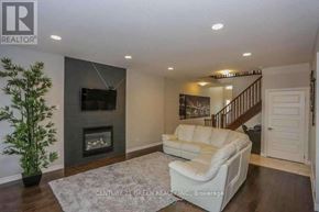 London North (North C) apartment for rent - A living room with a fireplace and a couch.