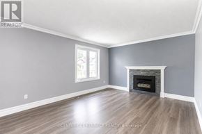 Brampton (Heart Lake West) apartment for rent - A room with a fireplace and a window.