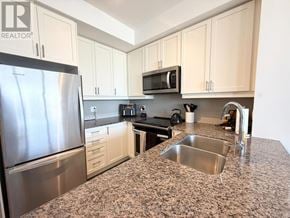 Milton (De Dempsey) condo for rent - A kitchen with granite countertops and stainless steel appliances.