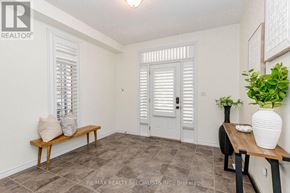 Guelph (Victoria North) apartment for rent - A room with a bench, a table, and a plant.