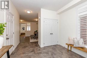 Guelph (Victoria North) apartment for rent - A living room with a couch and a bench.