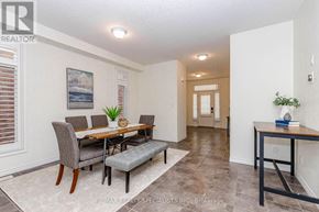 Guelph (Victoria North) apartment for rent - A dining room with a table and chairs.