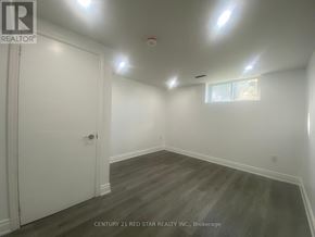 Toronto (Elms-Old Rexdale) apartment for rent - A room with a white door and a window with a white frame.