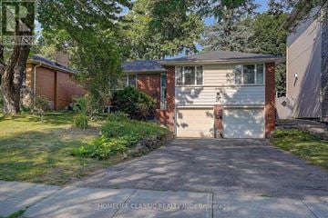 Richmond Hill (Mill Pond) apartment for rent - A house with a driveway and garage is for sale.