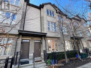 Markham (Commerce Valley) townhouse for rent - A building with the number 219 on the front door.