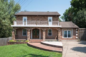 Nashville house for rent - 4BR/3.5BA Colonial | Main-Level Primary Suite, Stainless Appliances & Spanish-Style Balcony