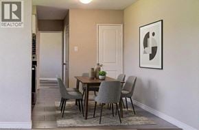London apartment for rent - A dining room with a table and chairs.