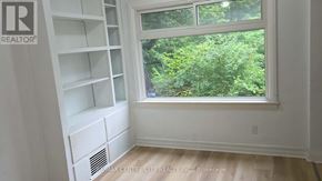 London North (North G) apartment for rent - A room with a window and a shelf.