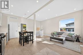Toronto (Banbury-Don Mills) apartment for rent - A modern living room with a dining area and kitchen in the background.