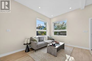 Toronto (Banbury-Don Mills) apartment for rent - A living room with a grey couch and a coffee table.
