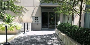 Toronto (Niagara) condo for rent - The image shows a building entrance with a glass door and a sign that reads "ZZ5".