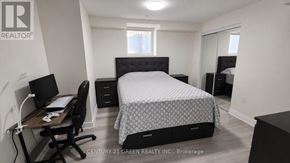 Milton (Fo Ford) apartment for rent - A bedroom with a bed, desk, and chair.