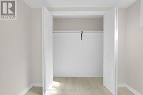 Barrie (Allandale Heights) apartment for rent - A white door with a key hanging on it.