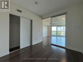 Toronto (Thorncliffe Park) condo for rent - A room with a sliding glass door leading to a balcony.
