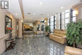 Mississauga (Hurontario) condo for rent - A spacious living room with a marble floor and furnished with a sofa, armchair, and a coffee table.