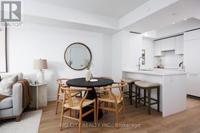 Toronto (Thorncliffe Park) condo for rent - A dining area with a round table and chairs.