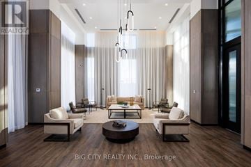 Toronto (Thorncliffe Park) condo for rent - A modern living room with a large sofa set and a coffee table.