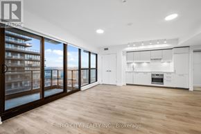 Toronto (Thorncliffe Park) condo for rent - A spacious kitchen and living room with a view of the city.