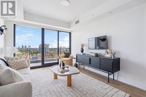 Toronto (Thorncliffe Park) condo for rent - A living room with a flat screen TV and a view of the city.